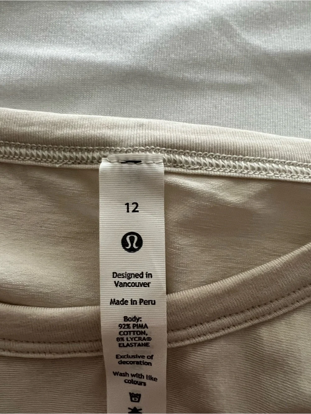 Lululemon Women’s Twist-Front Short Sleeve Top - Cream size 12